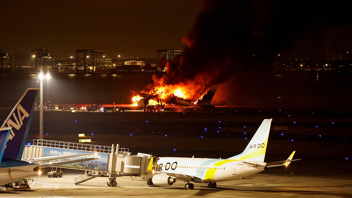 1704210899_288_VIDEO-Japan-Airlines-Plane-Crash-Lands-Bursts-into-Flames-at.jpg