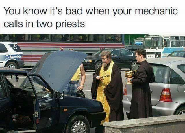 car with two priest.jpg