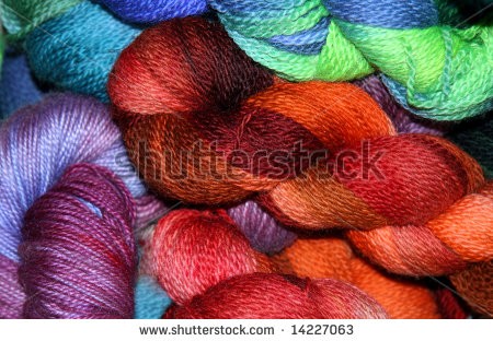 stock-photo-colorful-yarn-skeins-14227063.jpg