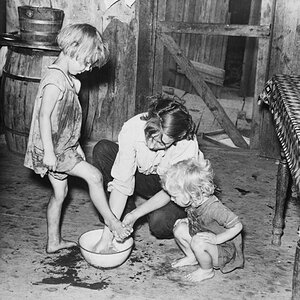 Mother washing children's 1938